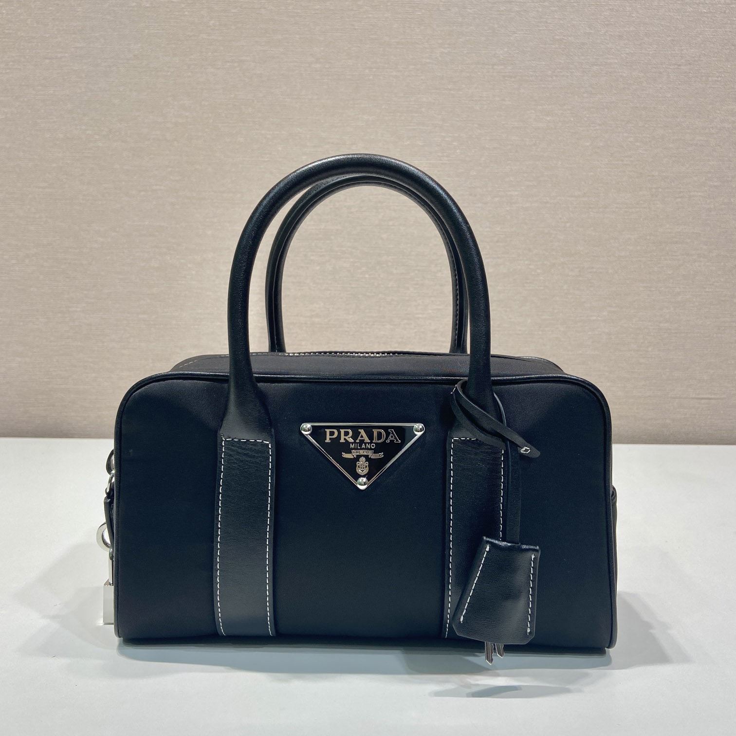 Pra*a top handle bags